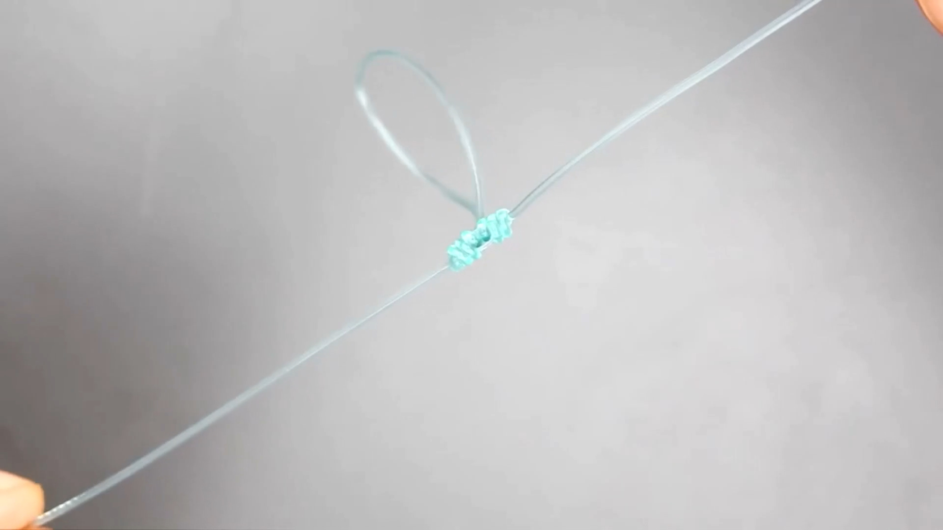 怎样给鱼线扎一个小结