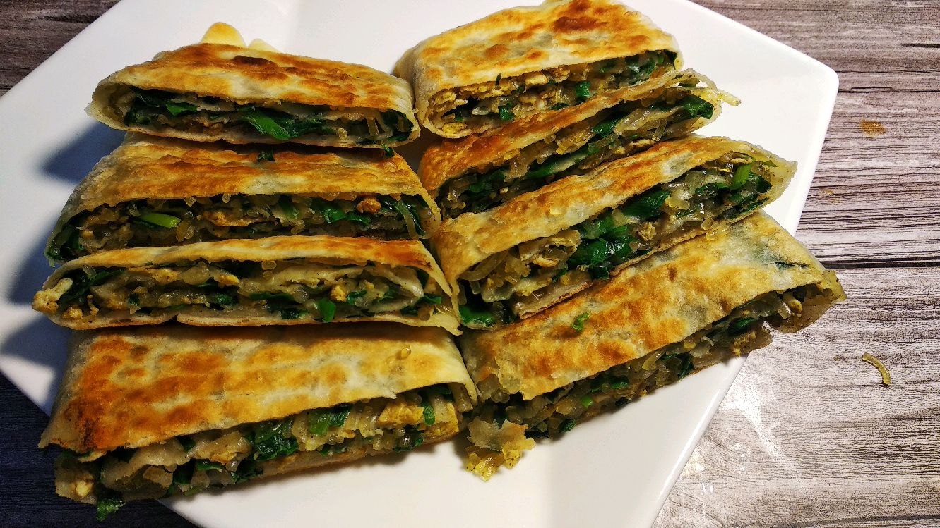 韭菜盒子的家常做法,一擀一卷,外酥里软,层层都是菜,做法简单