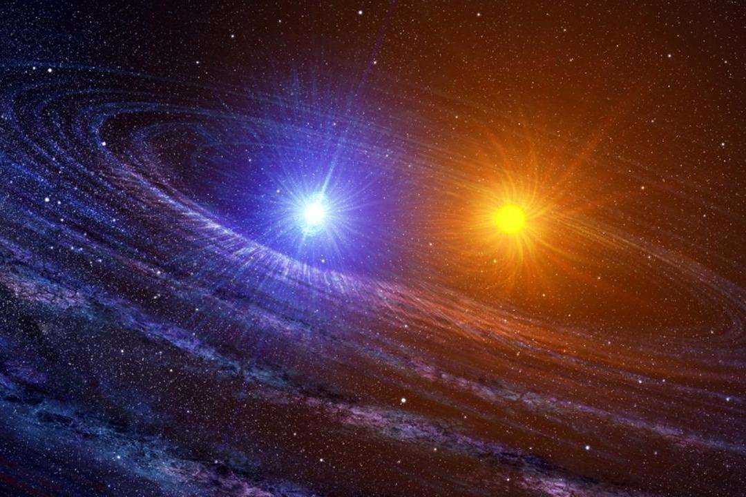 双星系统显示有四颗恒星和一个垂直定向的行星形成圆盘