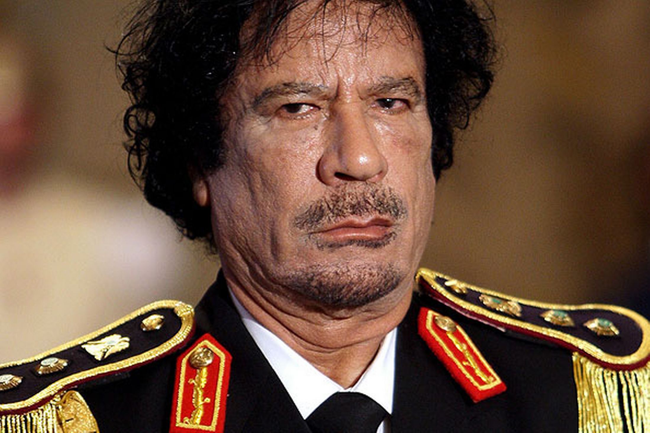统治利比亚42年,卡扎菲作为中东的"万王之王,却只是个上校?