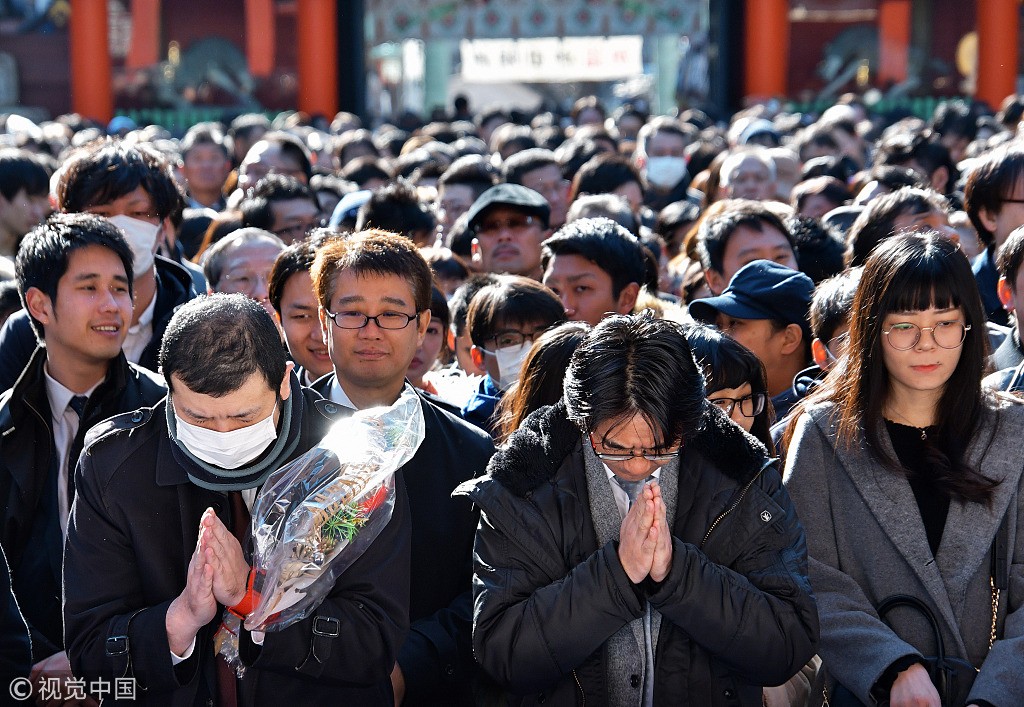 日本數千名上班族在新年第一個工作日祈禱