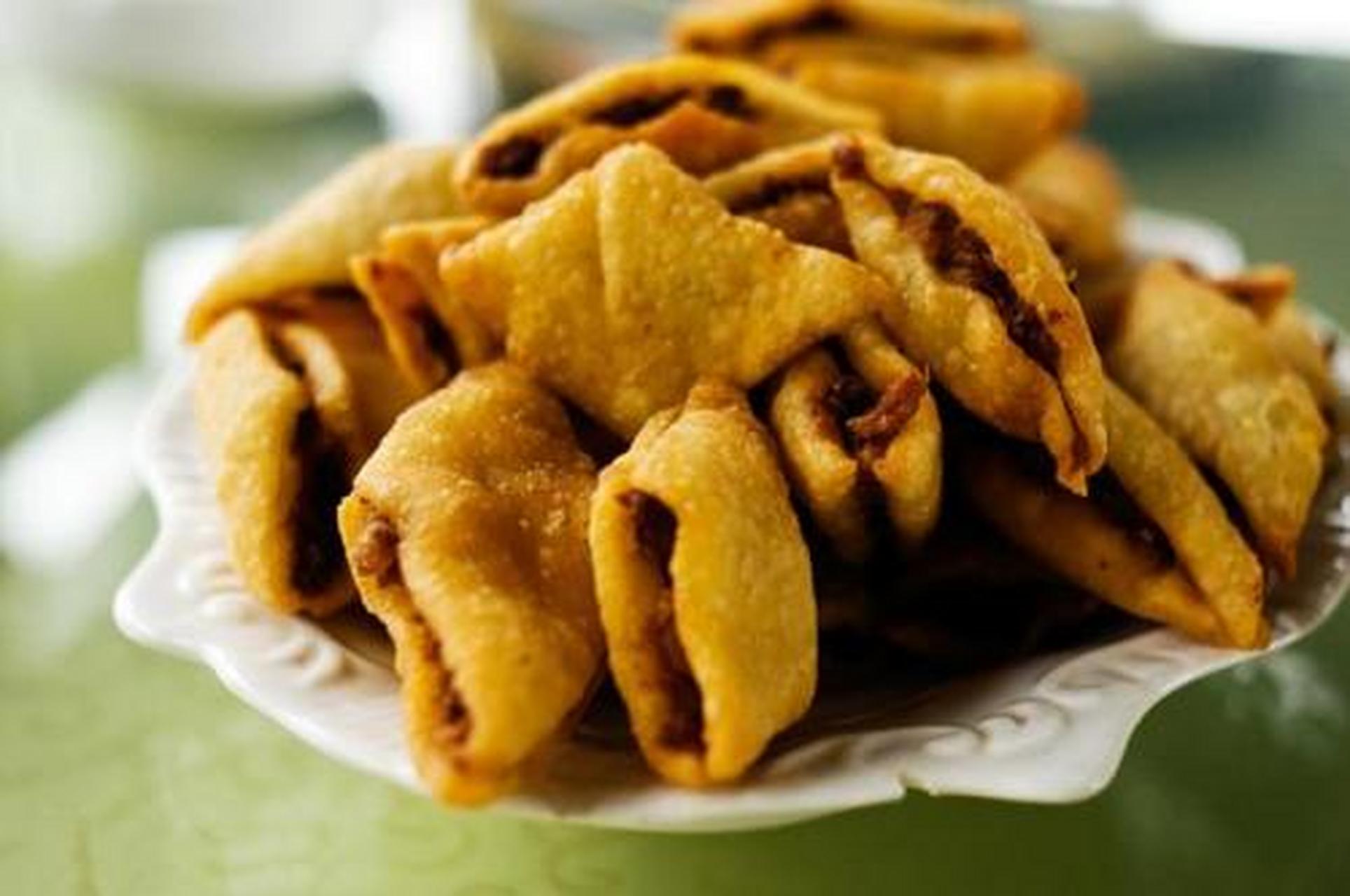 城市身边事#【北京市美食】炸咯吱是北京著名的汉族传统小吃,炸咯吱