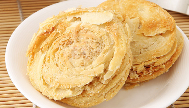 梓潼酥饼是四川的汉族传统名吃,当地特色糕点之一