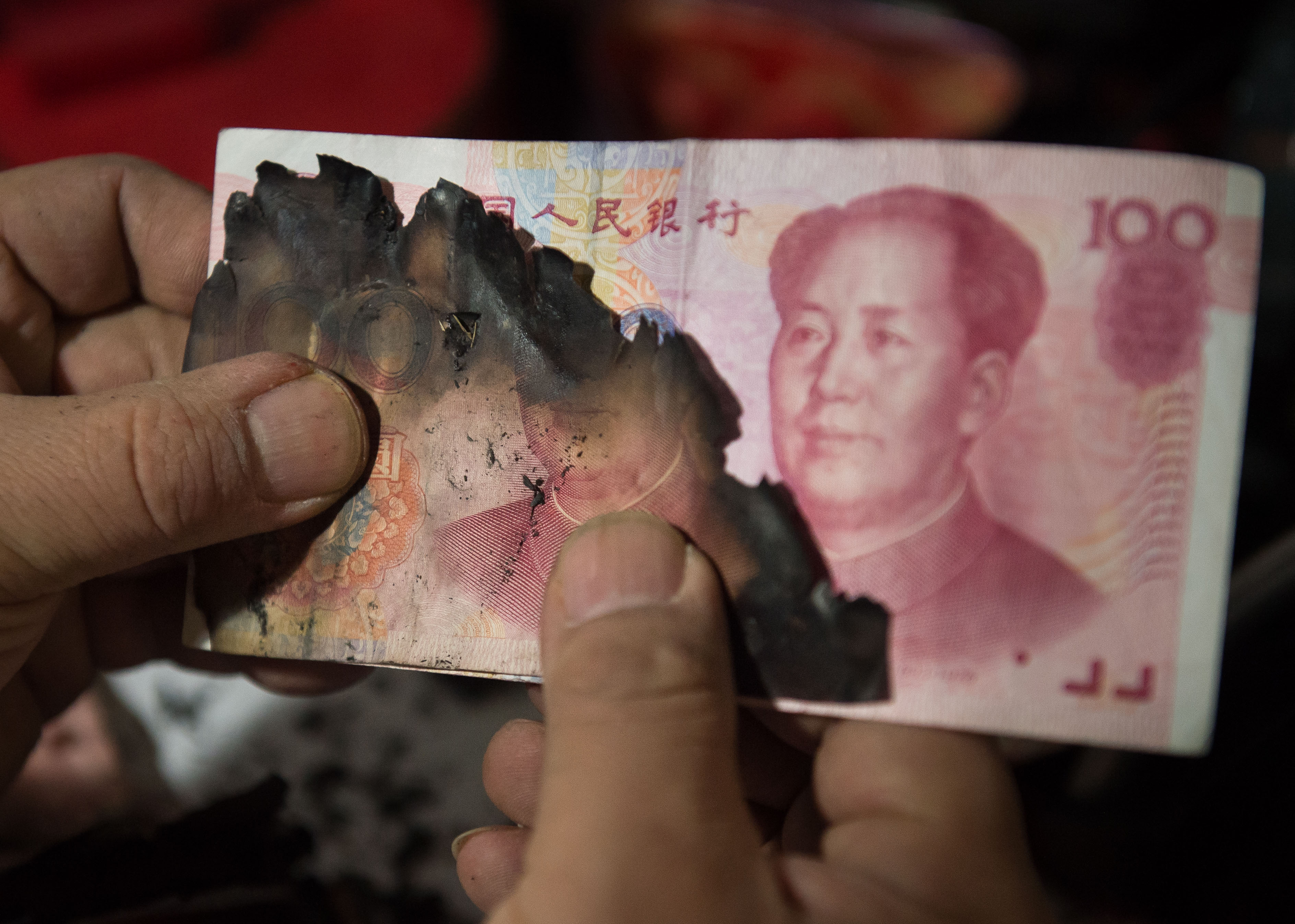 他对火烧币做手术 兑换残损人民币超千万