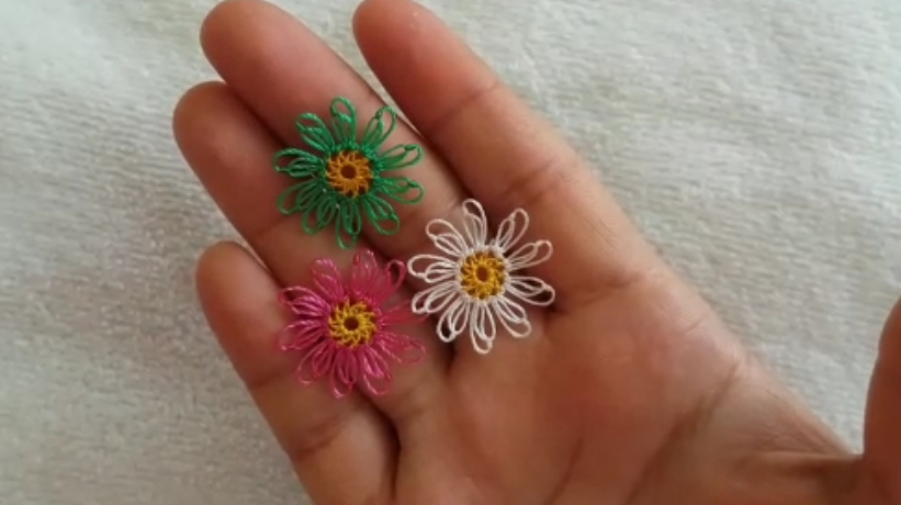 奇特的手工針線編織出漂亮的花朵，趕快來試試