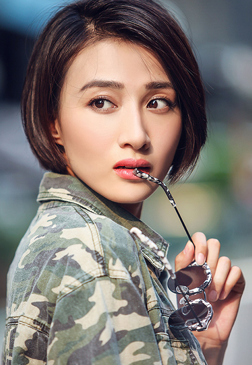 冯文娟的笑容里充满了自信和阳光,看到她心情都变得美丽