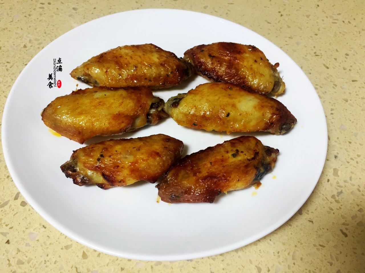 4,很简单,这样烤鸡翅版就做好了.