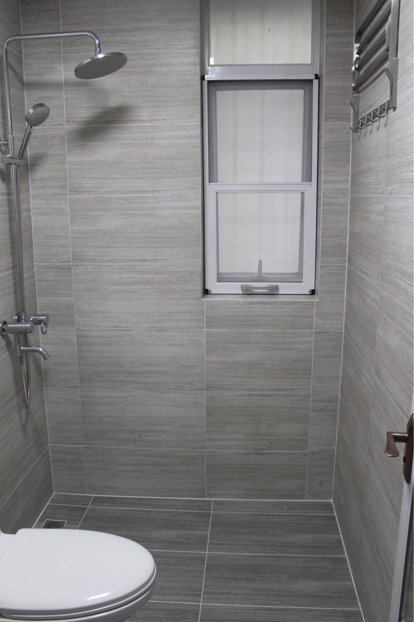 卫生间瓷砖怎么贴好看?好多人只贴"一半",省钱又上档次!