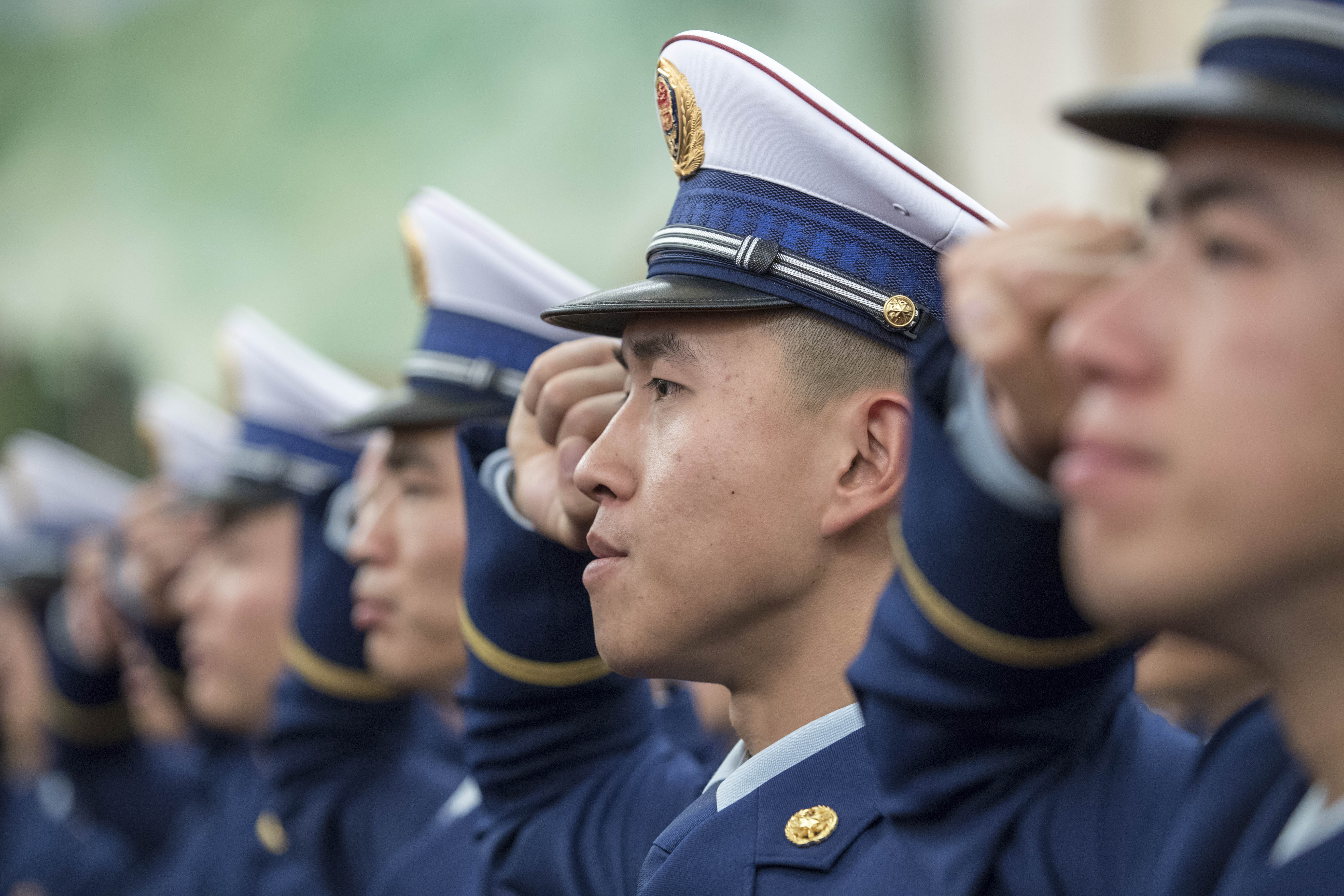 国家综合性消防救援队伍授旗仪式在京举行