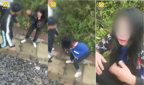 3男铁轨旁围殴1女 皮鞭砸石脸爆血:敢背叛就是死!