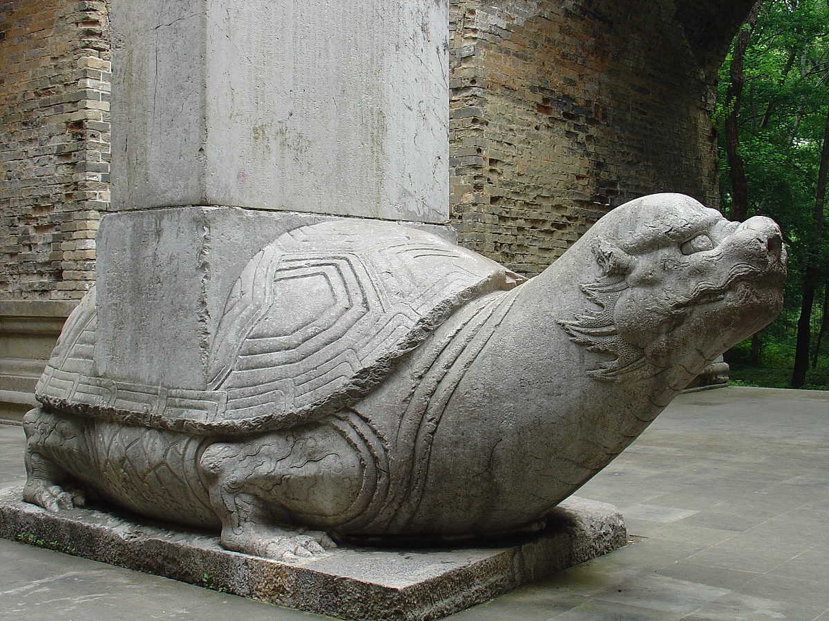 赑屃  庙前赑屃遭了罪, 都说是王八驮石碑