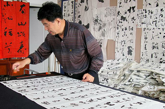 聂成文先生,你的书法离丑书只有一步之遥了,还中书协领导呢!