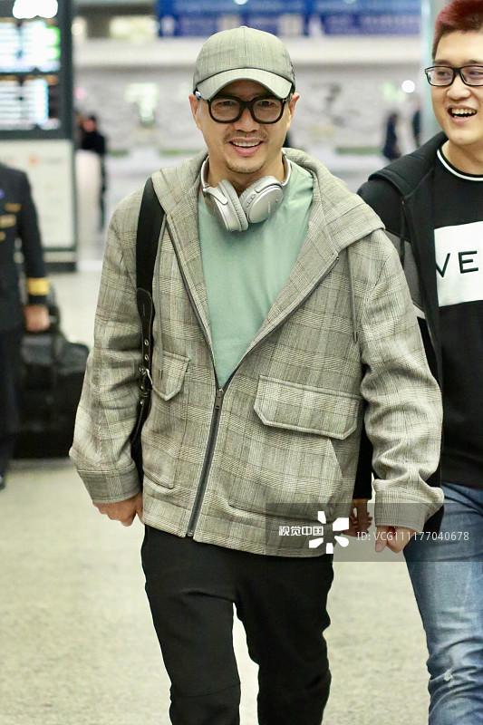 2018年11月19日,北京,段奕宏机场街拍.