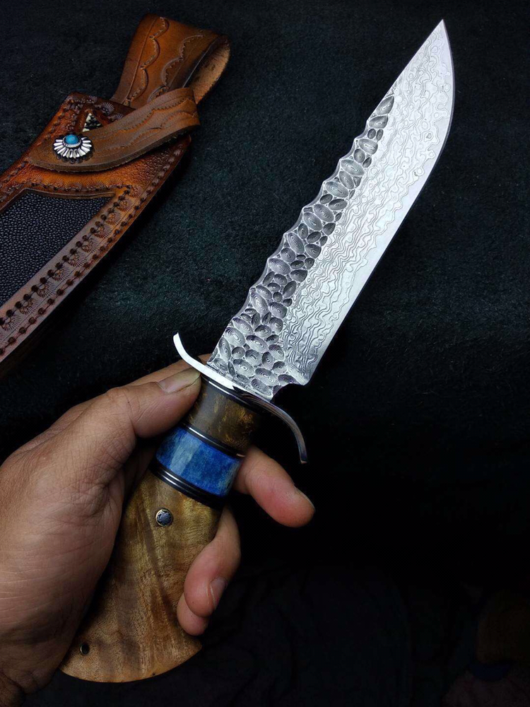 力作大马士革猎刀 钢材由日本进口vg10锻造大马士革钢,手柄采用树瘤木