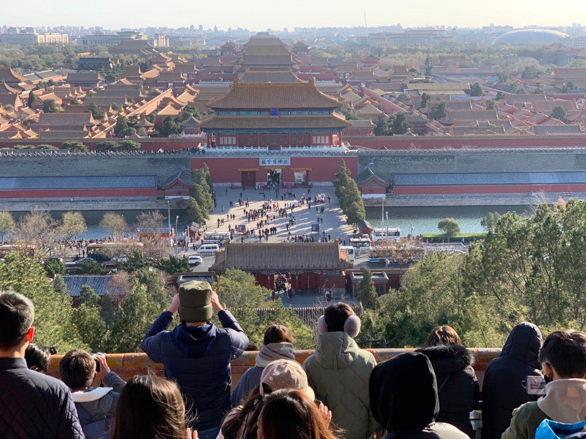 不惧大风严寒,他们全副武装景山顶拍冬景