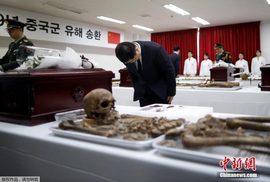 中韩举行在韩志愿军烈士遗骸装殓仪式