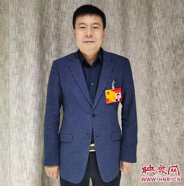 省人大代表李玉平:全省推行中小学生营养午餐统一配送