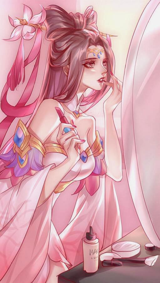 在化妆间补妆的婵儿,配上这身嫣桃色的服装更是显得绝世无双