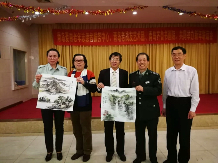 青岛齐鲁书画研究院携手合作单位于1月16日举办迎新春联谊会