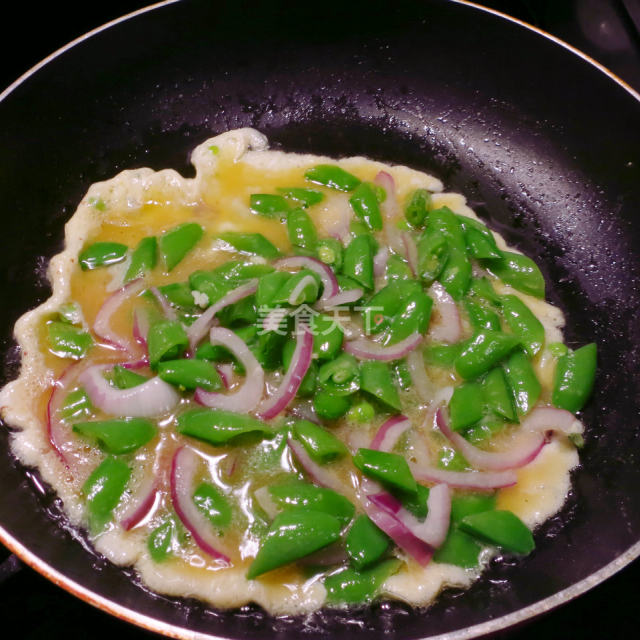 甜豆炒鸡蛋,多加1步,鸡蛋不但蓬松,而且鲜嫩可口!