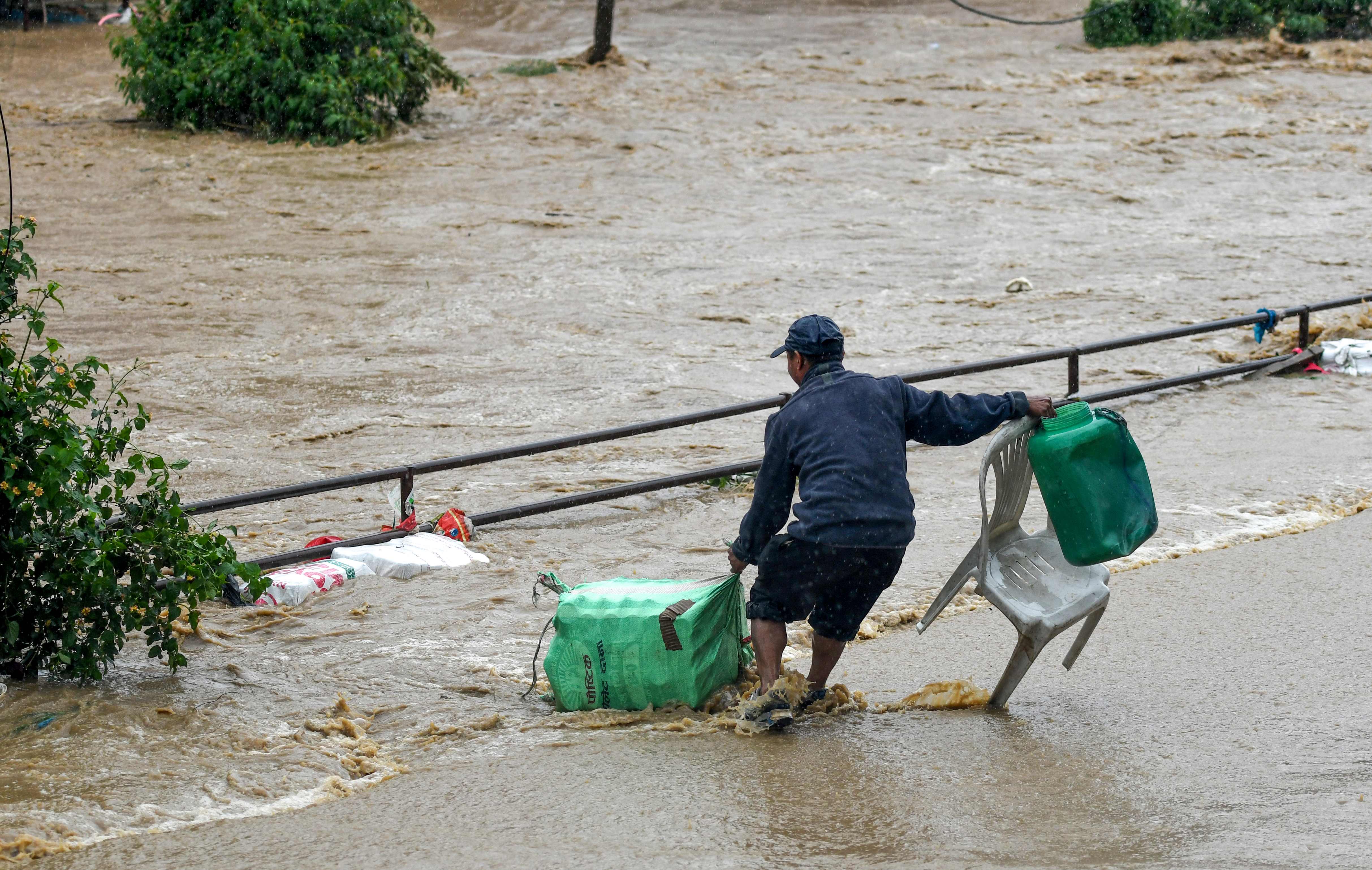 新华社照片,外代,2019年7月13日    (外代一线)(6)尼泊尔暴雨成灾17人