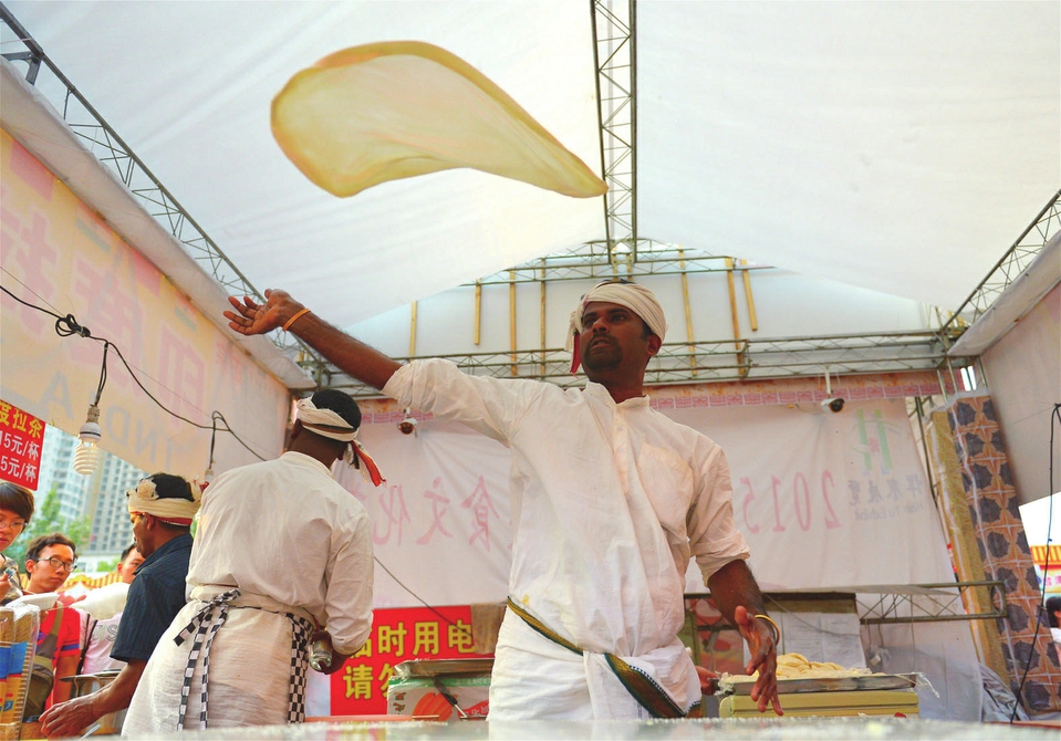 印度飞饼: 一种在空中飞的饼,美味可口,浓郁香酥.