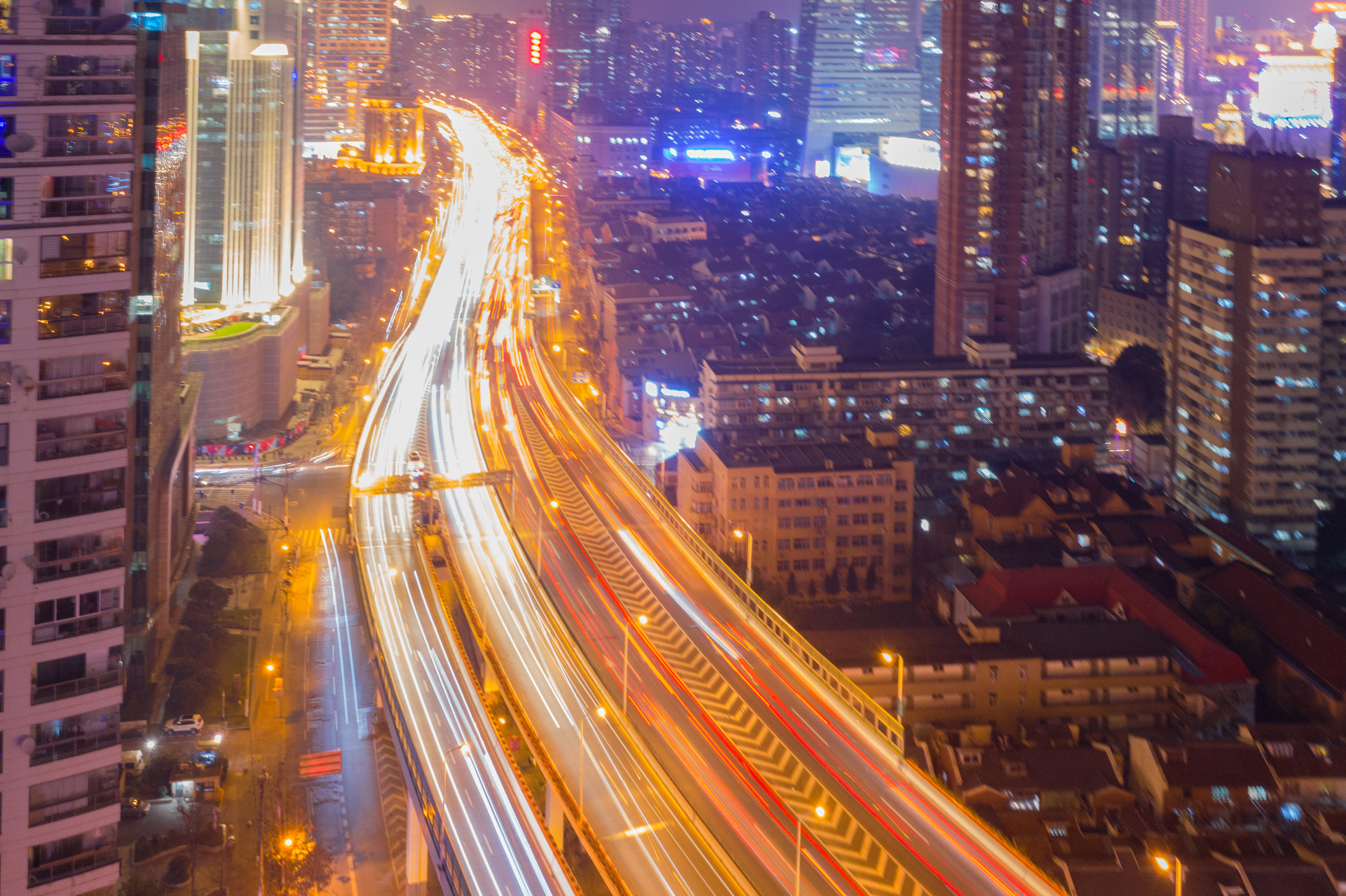 航拍上海延安东路立交桥夜景,五彩斑斓宛如巨龙盘旋