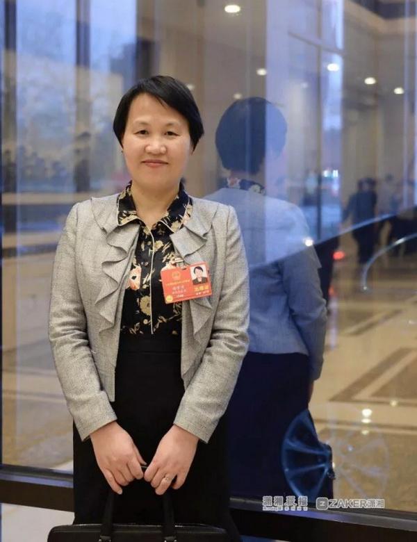 谢资清代表:优化环境,让"二孩"政策有效落地