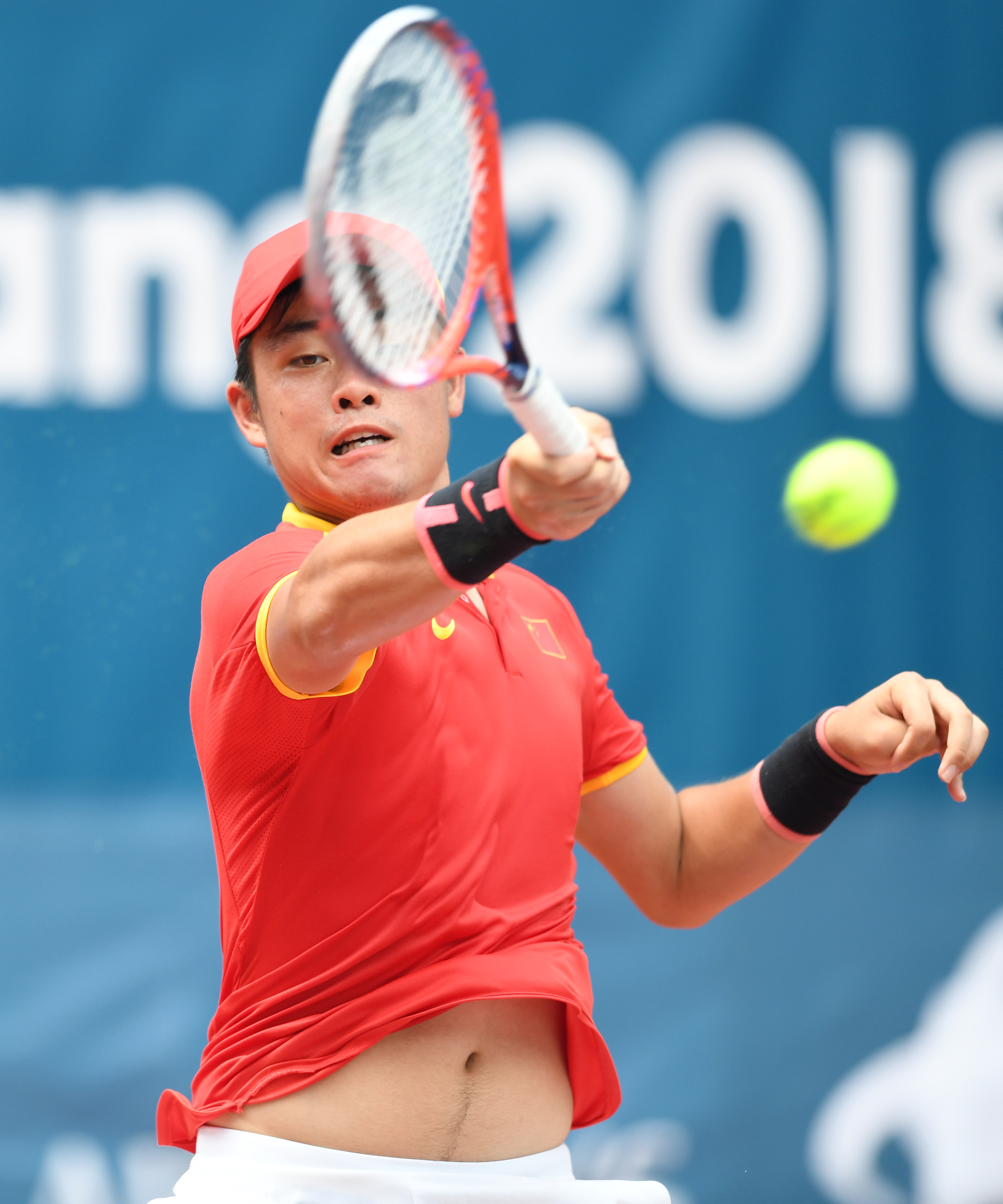 网球——中国队吴易昺获男单亚军