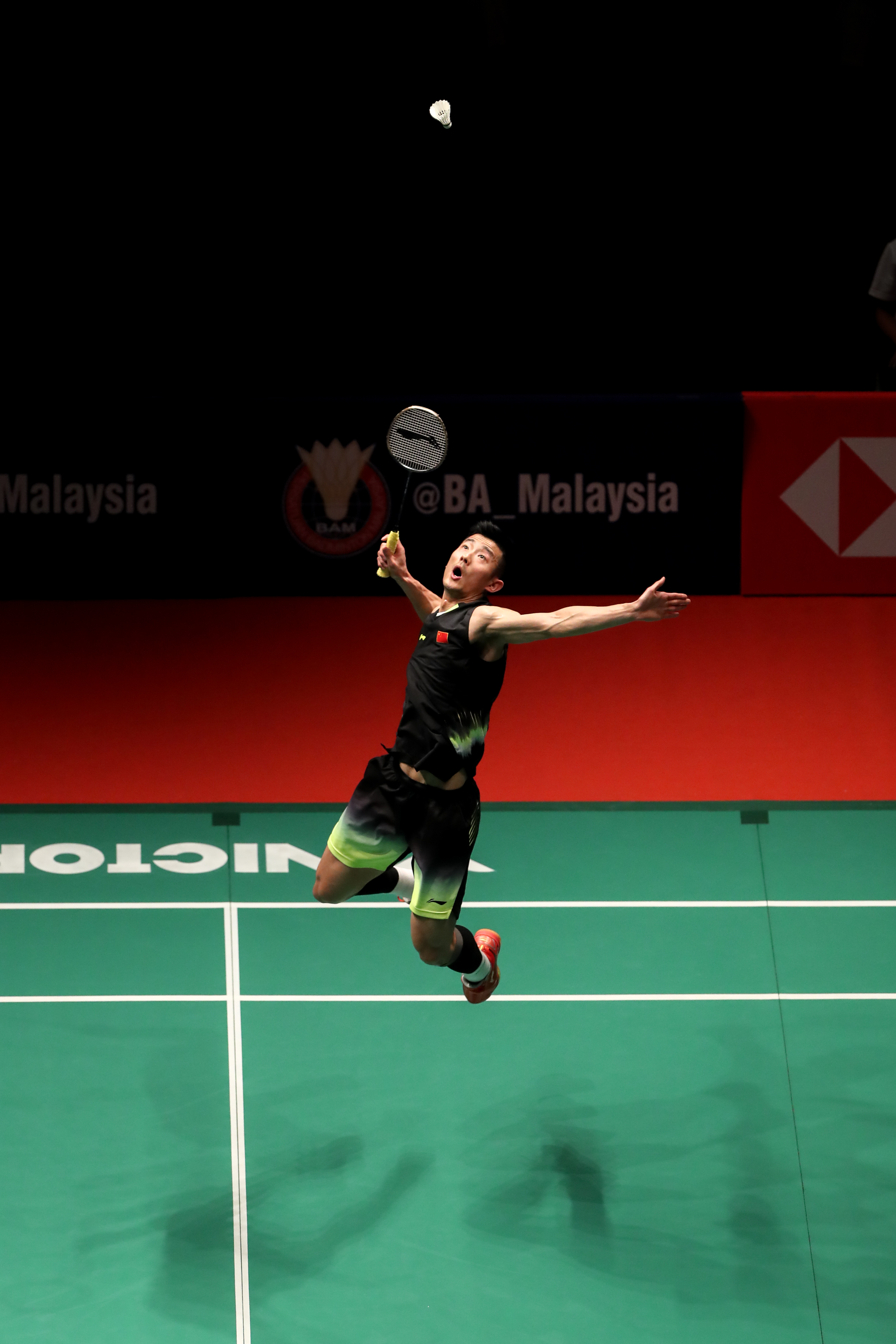 羽毛球——马来西亚大师赛:谌龙晋级八强