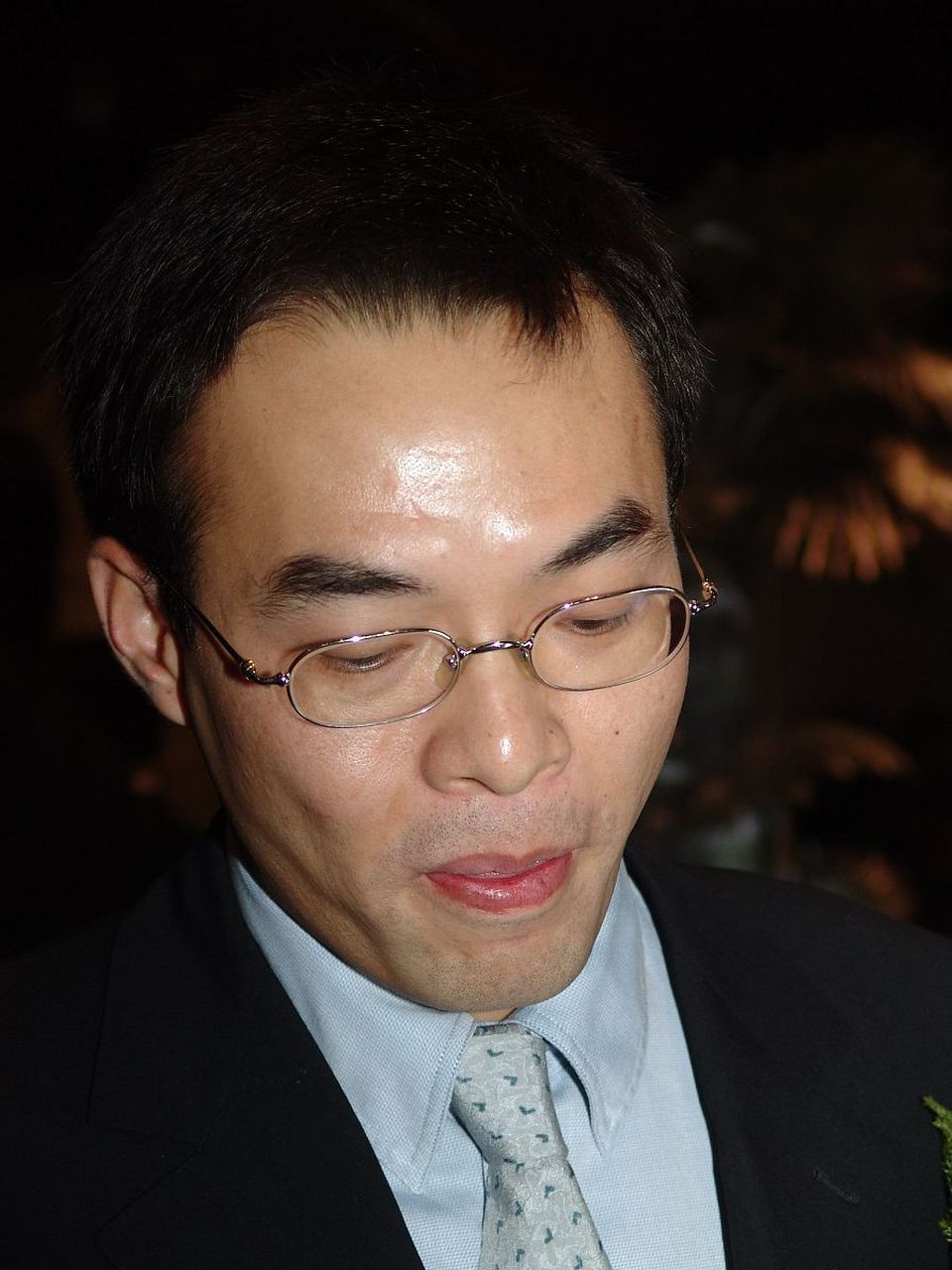 覃辉,资本市场昔日巨头因"天上人间"成名.