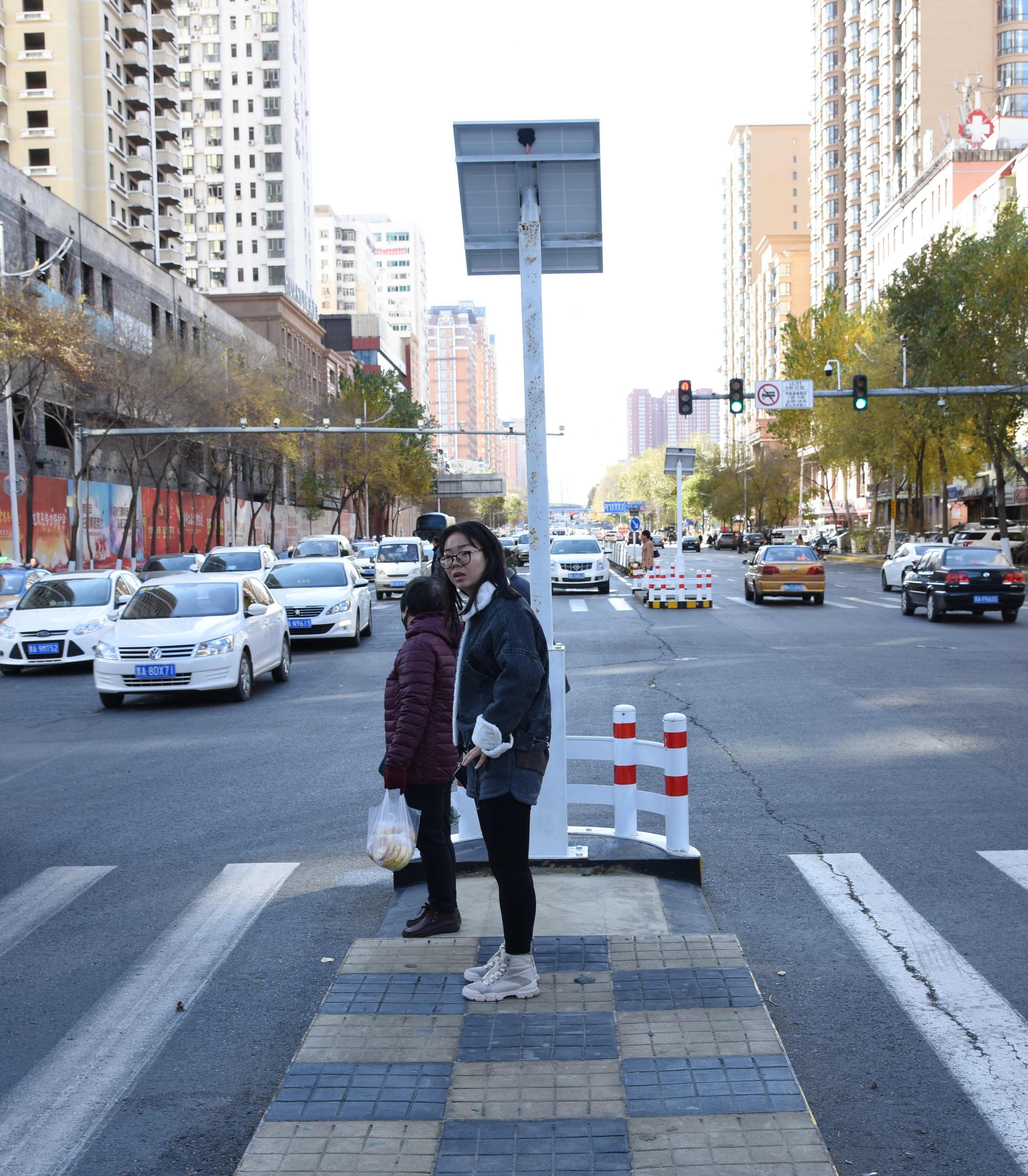 哈尔滨将新建70处行人二次过街"安全岛"