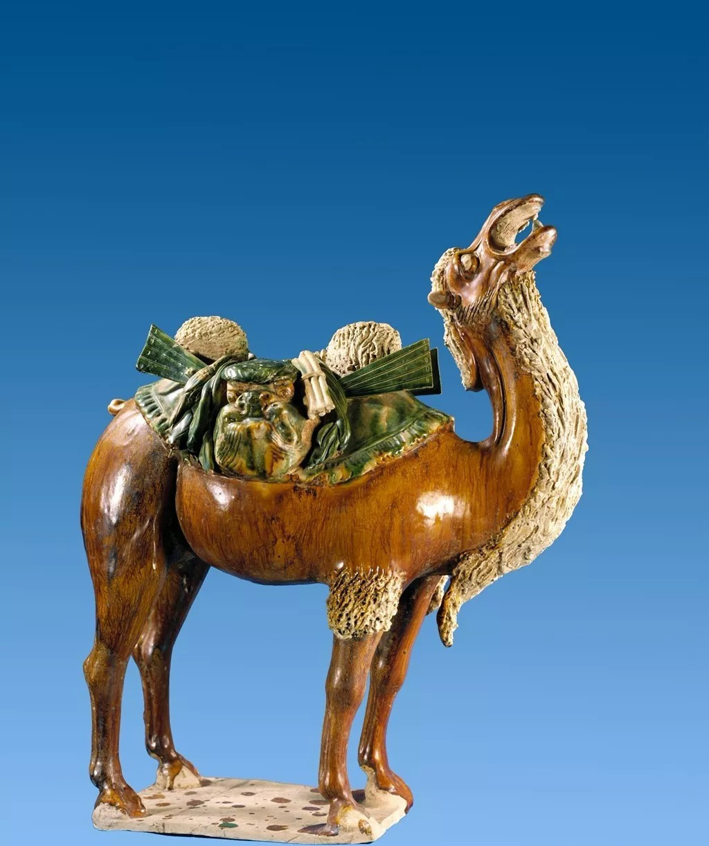 三彩胡人骑驼俑,唐代(咸阳郑仁泰墓出土 昭陵博物馆藏).