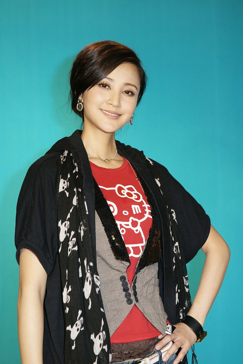 2005 年,走红后的"男人婆"张延怀孕了,她高兴地拨通了老公的电话,想着