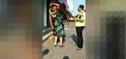 妻子大街狂扇丈夫耳光,丈夫就是不还手,网友:这种好男人不多了