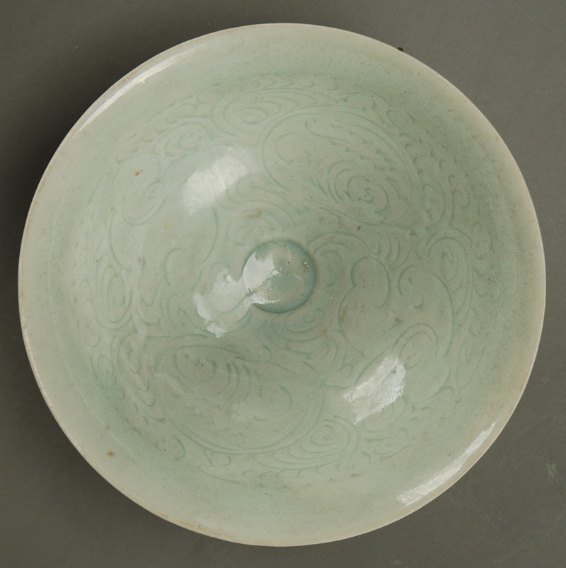 此器为雷公造像牛头马面,无角獠牙,肩生双翼,上身赤裸,腰系短裙,腰部