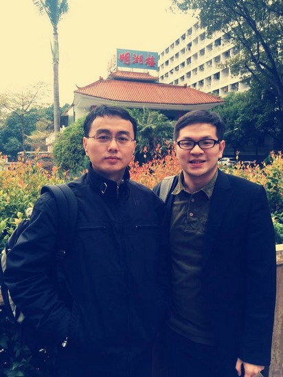 庄礼伟与暨大国际关系学博士后马立明合影.
