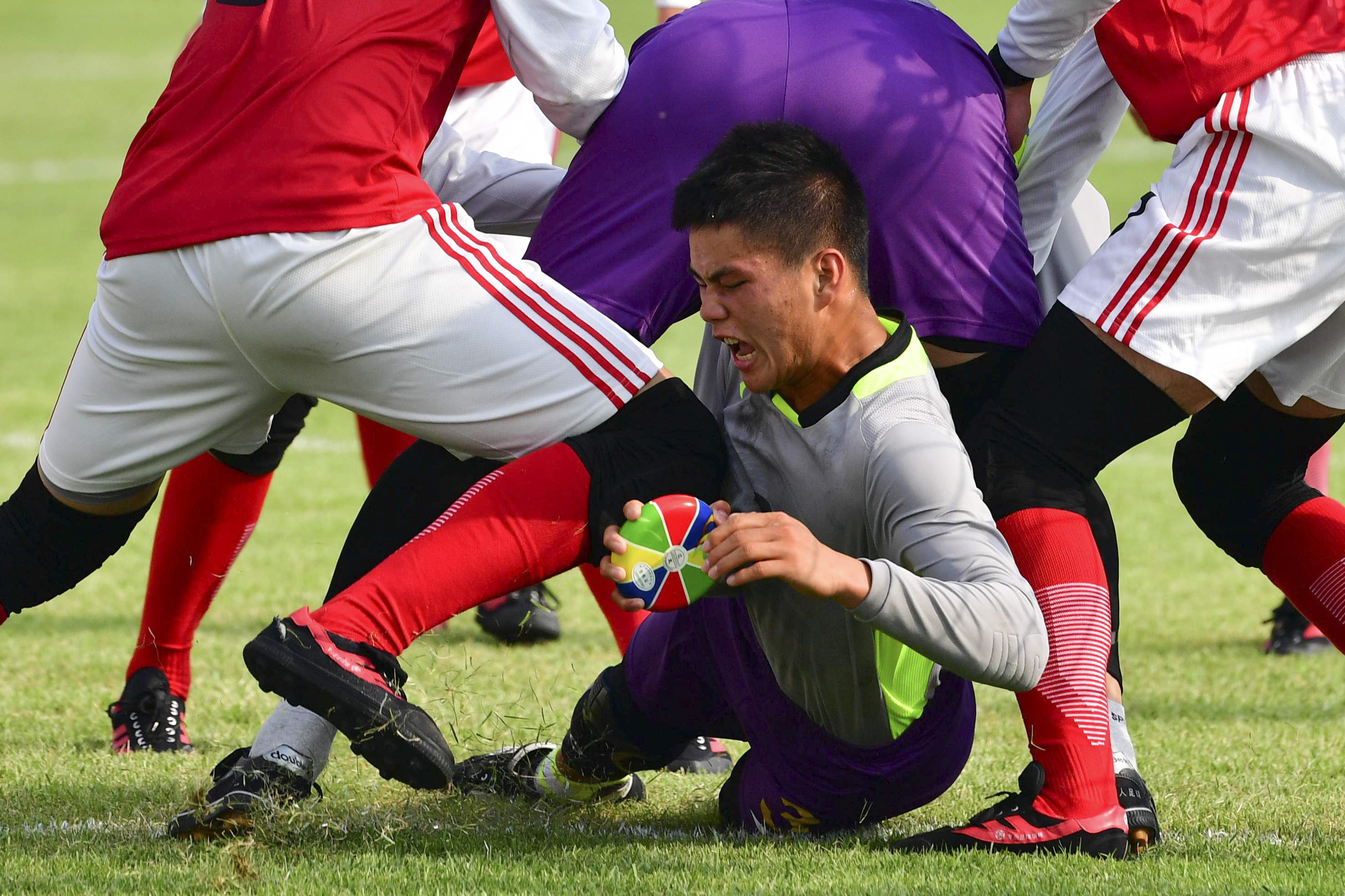 视频丨中式"疯狂橄榄球"