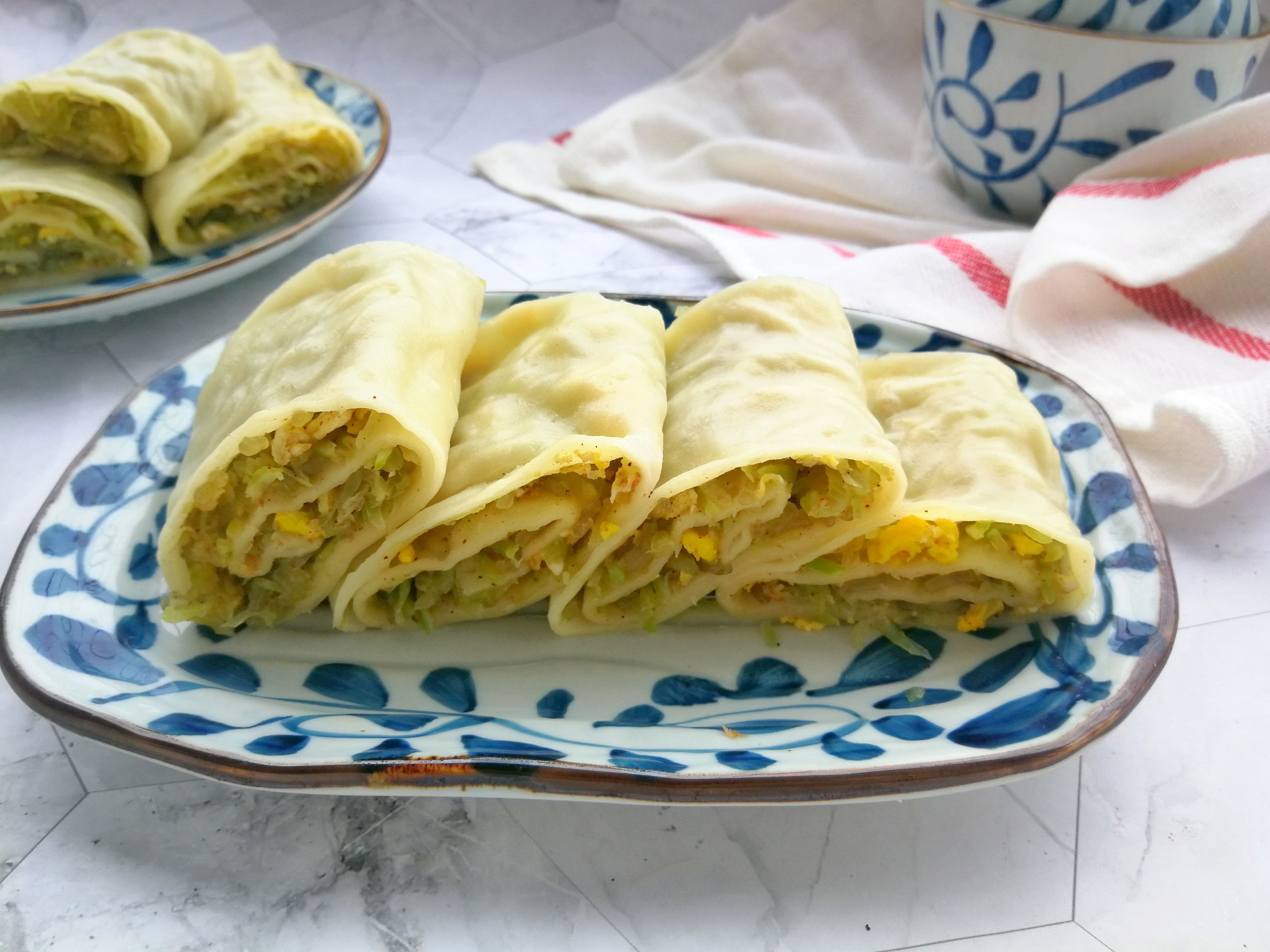 早餐吃萝卜卷,无需发面,皮薄馅儿多,比馒头包子简单多了