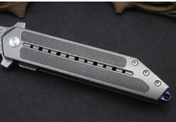 3cm 刃材:进口vg10大马士革钢 柄材:碳纤维 tc4钛合金cnc 刃长:9.