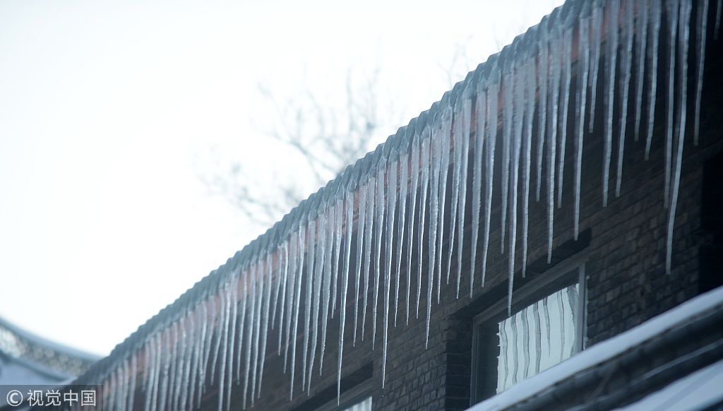 降雪持续行路艰难 扬州气象台发布道路结冰橙色预警