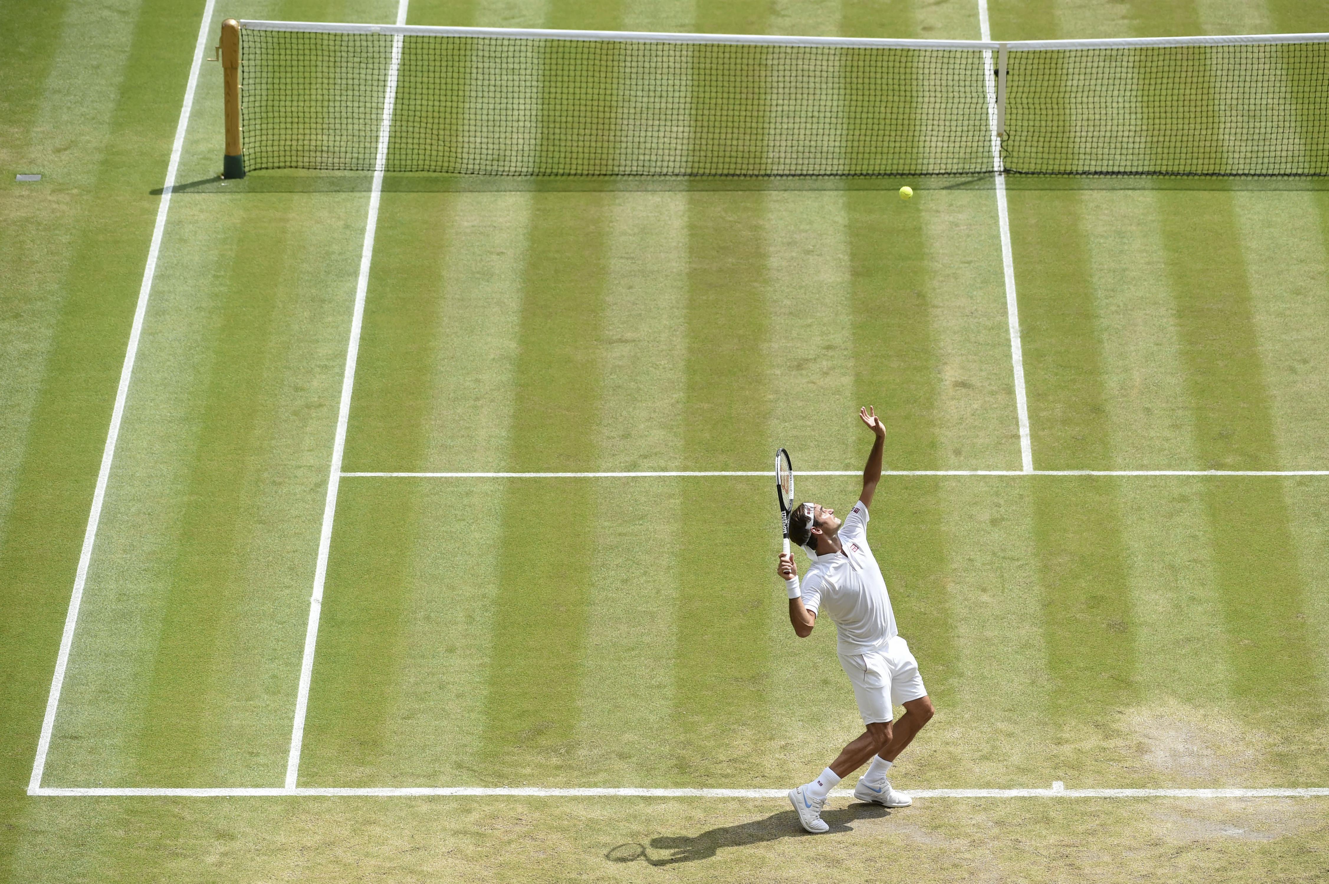 网球——温网:费德勒淘汰马纳里诺(2)