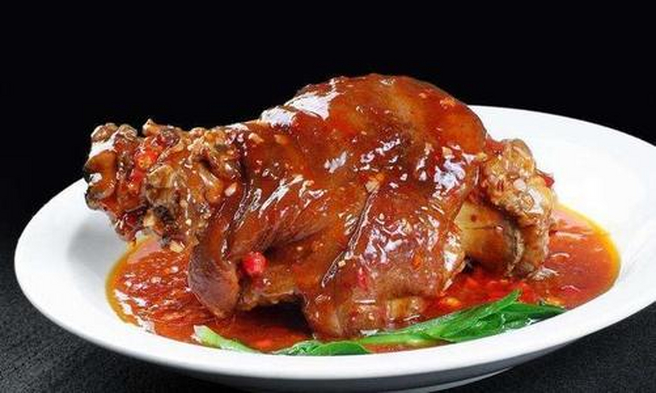 酱汁肘子是湖南省传统的汉族名菜,属于湘菜系.