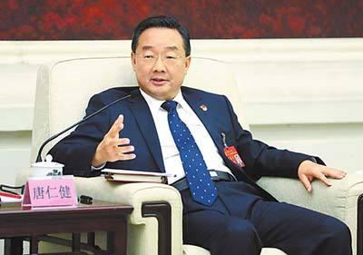 唐仁健会见唐志刚一行