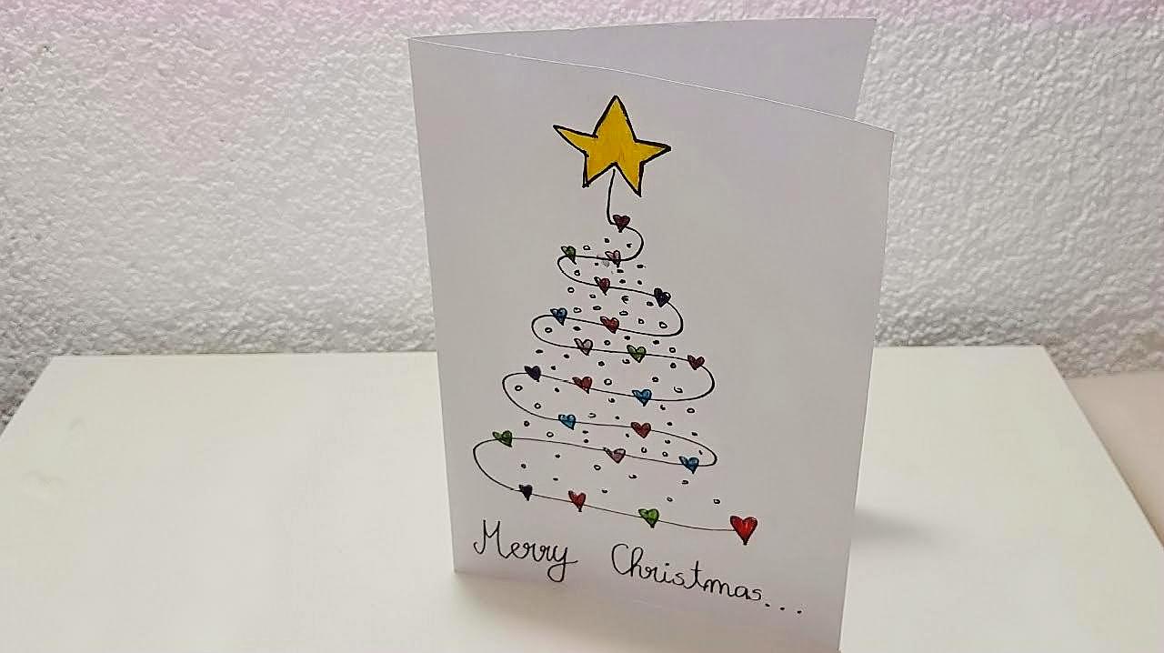 手工製作的聖誕節賀卡，封面是簡單手繪圖案，適合小學生