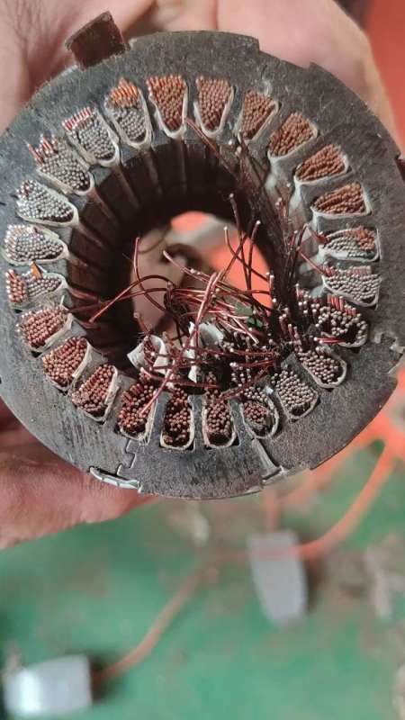 今天有位老铁收到2000台这种铜包铝电机,问我有没有自动分离的拆解