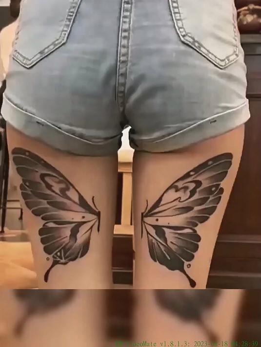 小姐姐在大腿纹身,图案真是个性