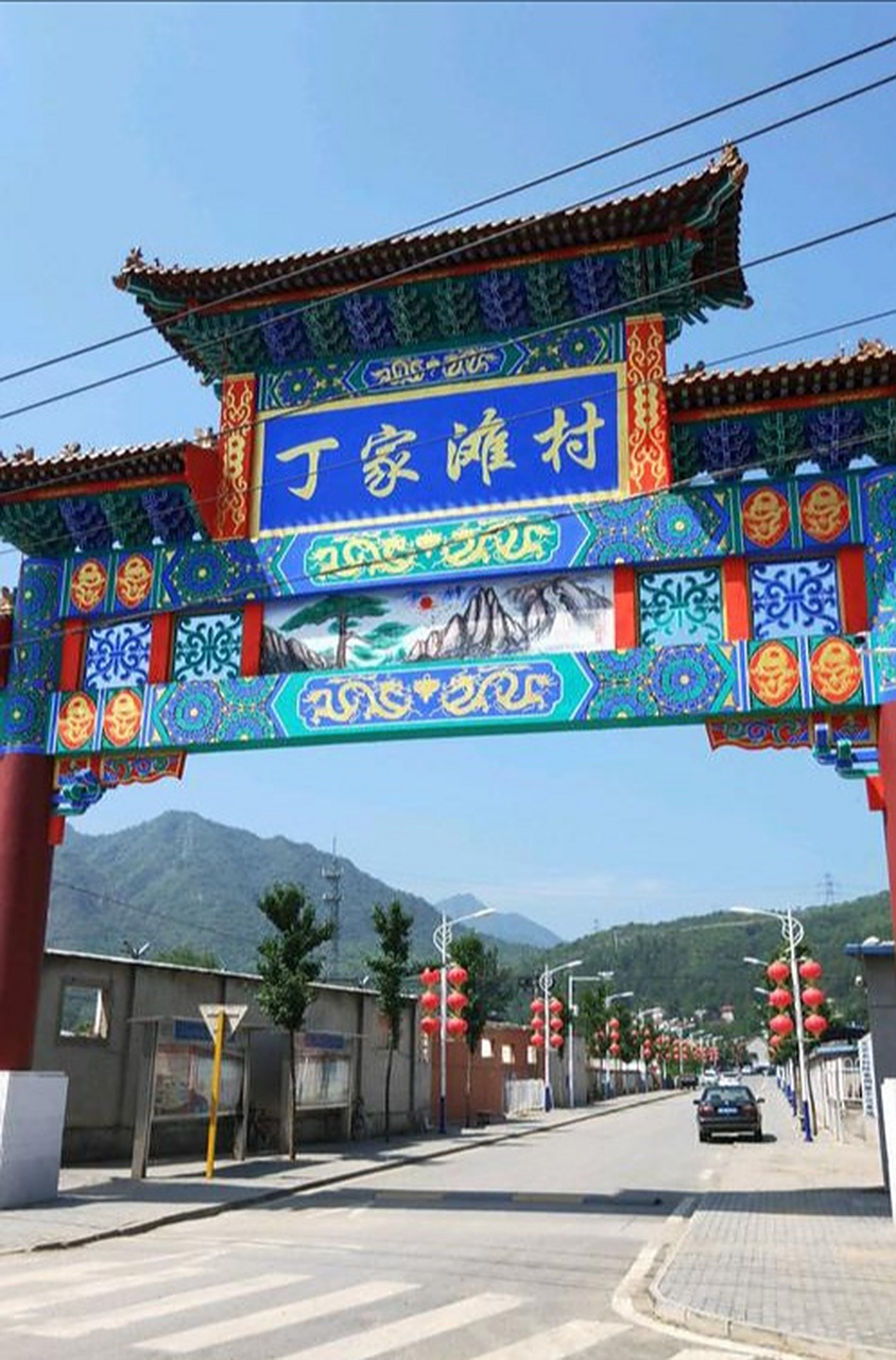 被北京暴雨里的这张图惊到了…… 丁家滩那个牌楼,现在淹到这么高了