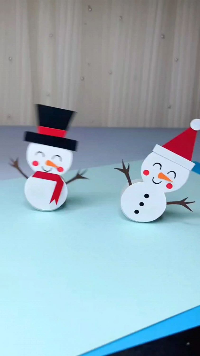 用瓶盖和小石头,制作可爱的小雪人不倒翁