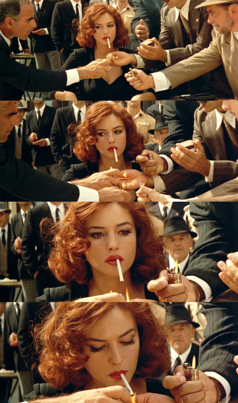 意大利女星莫妮卡·贝鲁奇因电影《西西里的美丽传说》爆红,其中点烟